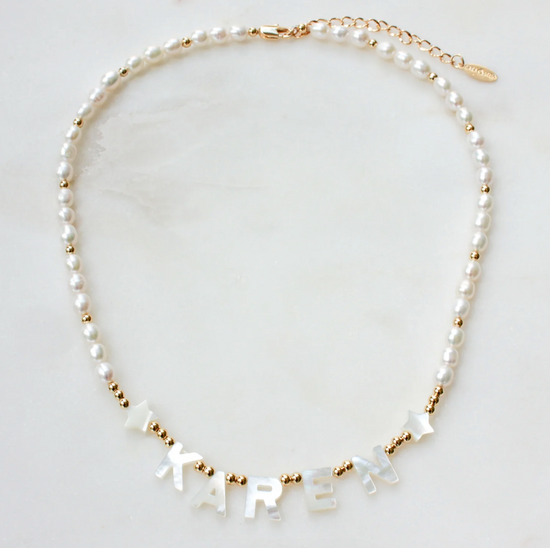 Meet our best seller necklace: Build Your Own Nacre Initial