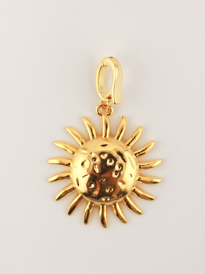 Hammered Sun Charm